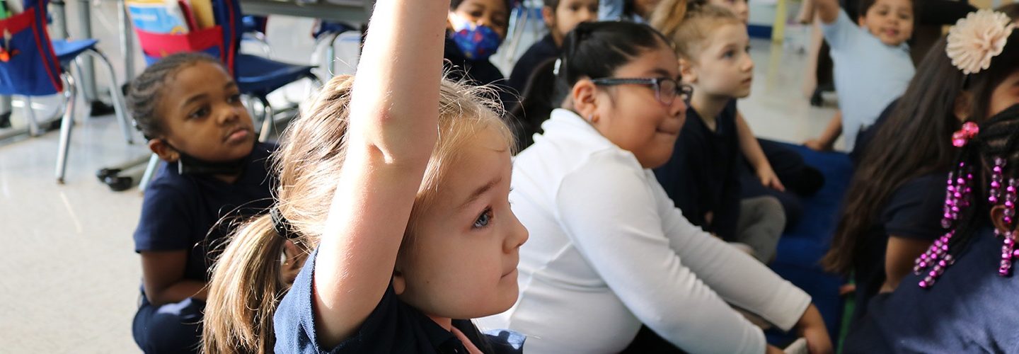 Girl-Raising-Hand-1440x500